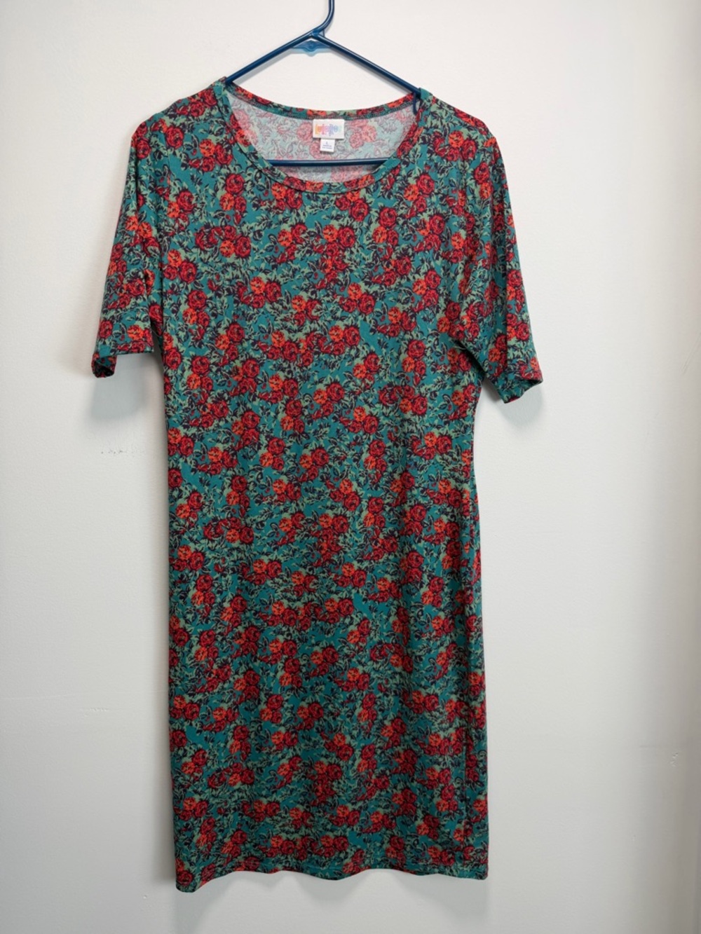 NWOT LuLaRoe Julia dress featuring a floral pattern.